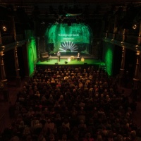 Impression from the "Norwegian Night" of the Norway 2025 Guest of Honor at the Schaubühne Lindenfels during the Leipzig Book Fair 2025 with two people on stage
