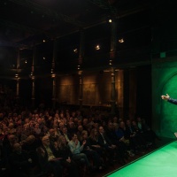 Program item “Norwegian Night” by the guest country Norway in 2025 at the Schaubühne Lindenfels theater during the Leipzig Book Fair 2025 with one person on stage