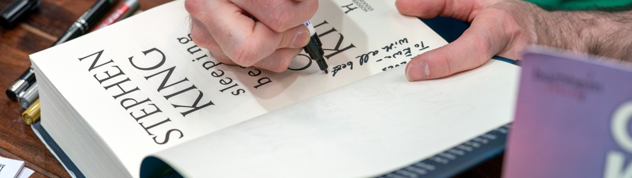 Owen King signs his book at the Leipzig Book Fair 2025