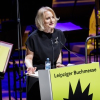 Astrid Böhmisch, director of the Leipzig Book Fair, at the lectern during the opening of the 2026 Leipzig Book Fair.