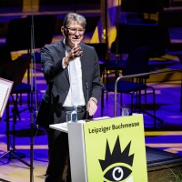 Wolfram Weimer, Minister of State for Culture and Media, at the lectern during the opening of the 2026 Leipzig Book Fair.